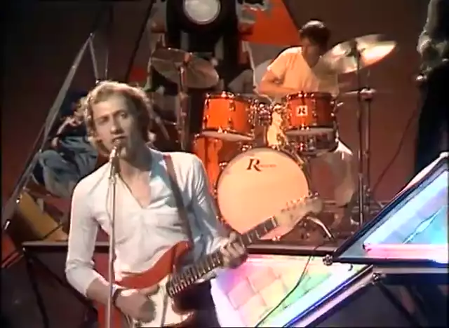 Dire Straits - Sultans Of Swing  (Official Music Video)